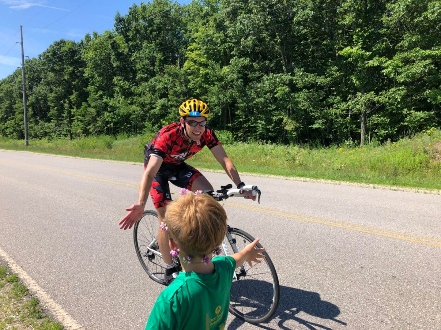 Chris Larson riding a bike in a marathon